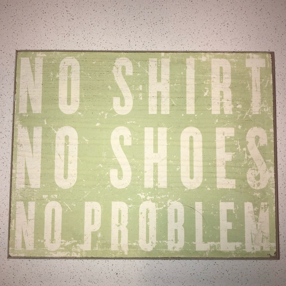 green/white wooden distressed beach sign